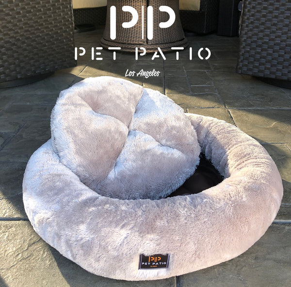 Gray dog bed by Pet Patio